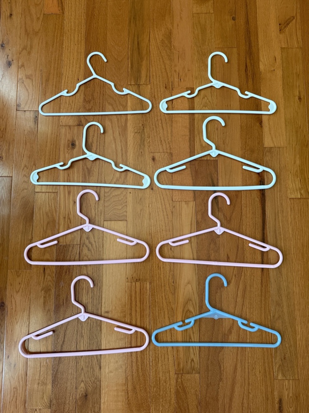 (8) Pastel Plastic Children’s Clothing Hangers - Blue, White, & Pink